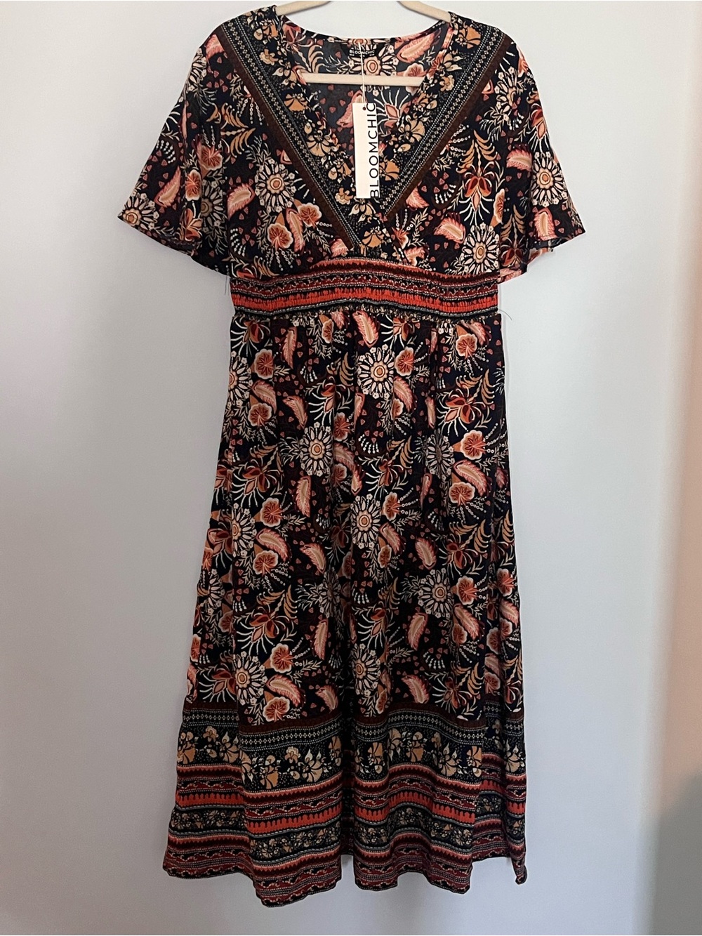 BloomChic Black Midi Dress with Peach Floral Print